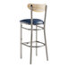 A Lancaster Table & Seating bar stool with a blue vinyl seat and metal frame.