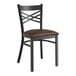 A black Lancaster Table & Seating metal chair with a dark brown cushion.