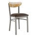 A Lancaster Table & Seating Boomerang chair with a cushioned dark brown vinyl seat and driftwood back.