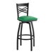 A black metal bar stool with a cross back design and a green vinyl padded swivel seat.