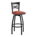 A black metal swivel bar stool with a cross back design and a burgundy vinyl padded seat.