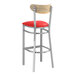 A Lancaster Table & Seating bar stool with a red vinyl seat and driftwood back.