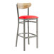 A Lancaster Table & Seating bar stool with a red vinyl seat and driftwood back.