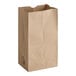 A bundle of brown Duro heavy duty shorty paper bags.