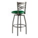 A Lancaster Table & Seating clear coat metal swivel bar stool with a green vinyl seat.