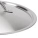 A Vollrath stainless steel domed pan lid with a metal handle.