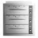 A silver ServIt triple drawer warmer with knobs.