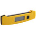 A yellow Taylor digital thermometer with a screen and rectangular window.