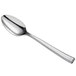 A silver spoon with a stainless steel handle.