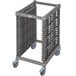 A grey plastic Cambro sheet pan rack with wheels.