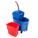 A blue Rubbermaid mop bucket with a red dirty water bucket.