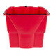 a red plastic bucket with a black handle