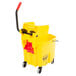 A Rubbermaid yellow mop bucket with a red wringer handle.