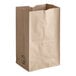 A bundle of Duro brown paper bags with a white label.