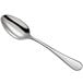 An Arcoroc stainless steel teaspoon with a silver handle and spoon.