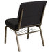 a black chair with gold dots
