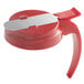 a red lid with a knife on it