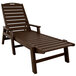 A brown POLYWOOD Nautical chaise lounge chair with arms.