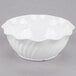 A white Cambro Camwear swirl bowl.