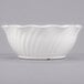A white Cambro polycarbonate bowl with a wavy swirl design.