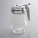 A clear polycarbonate teardrop syrup server with a chrome lid.