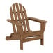 A teak POLYWOOD classic Adirondack chair with armrests.