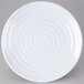 A white GET Milano melamine plate with a spiral pattern.