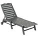 A grey POLYWOOD Nautical chaise lounge chair with wheels.