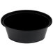 A black oval plastic souffle container with a lid.