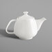 A close-up of a white RAK Porcelain Nano teapot with a lid.