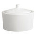 A white porcelain sugar bowl with a matching lid.