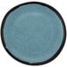 A close-up of a GET Matte Speckled Grayish Blue Melamine Bread Plate with a blue speckled surface.