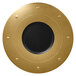 A gold porcelain plate with a black center.