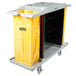 A Lavex Hotel housekeeping cart with a yellow bag.