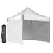 A white E-Z Up canopy with a black bag