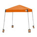 an orange tent with two legs