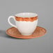 A white porcelain coffee cup and saucer with a brown rim.