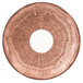 a white plate on a brown surface