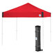 A red E-Z Up pyramid canopy with a white frame and a black bag on the side.