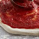 A pizza with Stanislaus Pizzaiolo sauce on top.