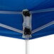A blue Backyard Pro Courtyard Series instant canopy with metal poles.