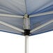 A blue and white steel canopy with metal poles.