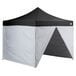 a black tent with a triangular top