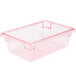 A clear plastic container with a red lid.