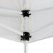 A white Backyard Pro canopy with black metal brackets.