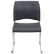 A charcoal National Public Seating stack chair with chrome legs.