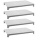 A white Cambro Camshelving stationary shelf kit with 4 white solid shelves.