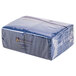 A stack of navy blue Hoffmaster paper dinner napkins.