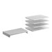 A white Cambro Camshelving Premium stationary kit with 3 vented and 1 solid white plastic shelves.
