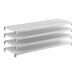 A white stationary shelving kit with three vented shelves and one solid shelf.